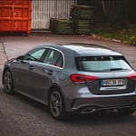 Mercedes-Benz A-Klasse W177 Heck-Seitenansicht auf Parkplatz im Industriegebiet